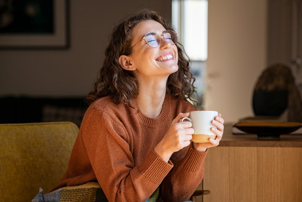 happy woman having a coffee break