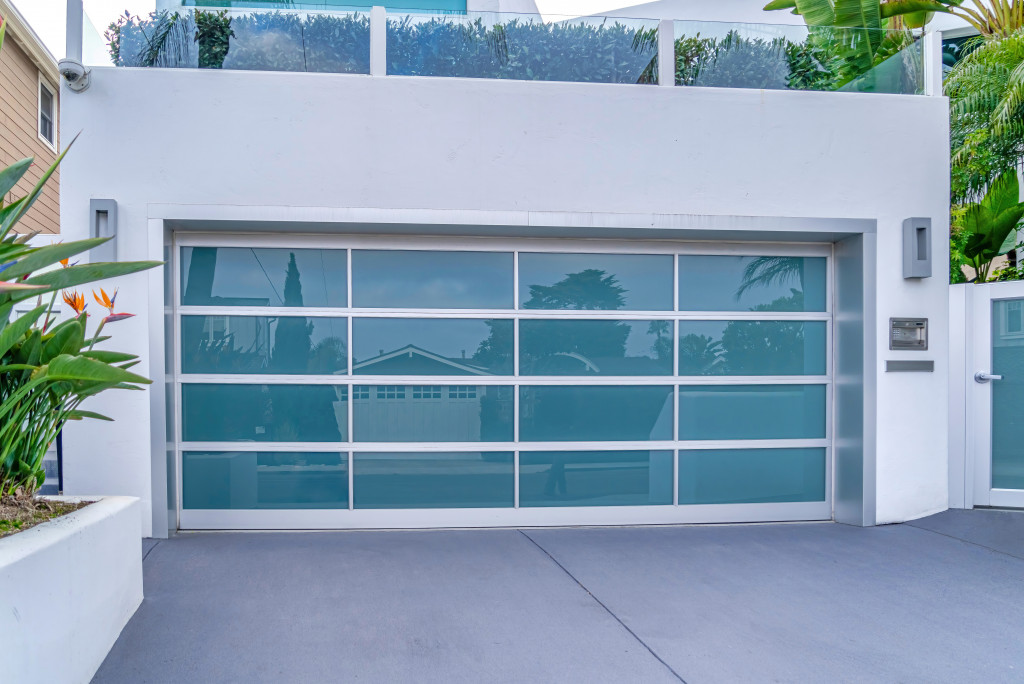 A garage with a blue glass door