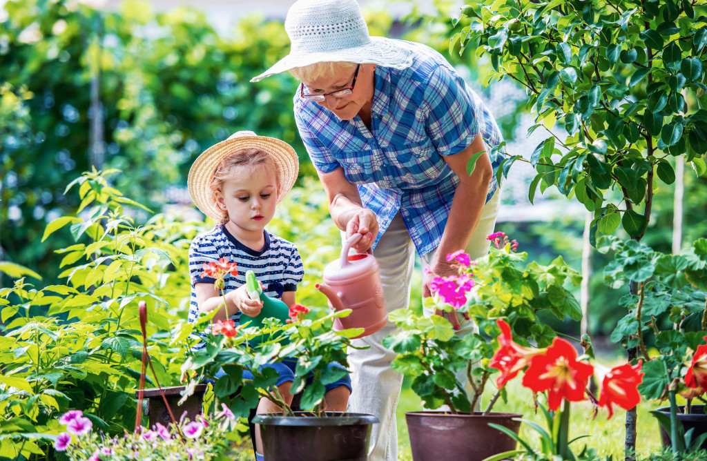 grandma planting with her young grandchild